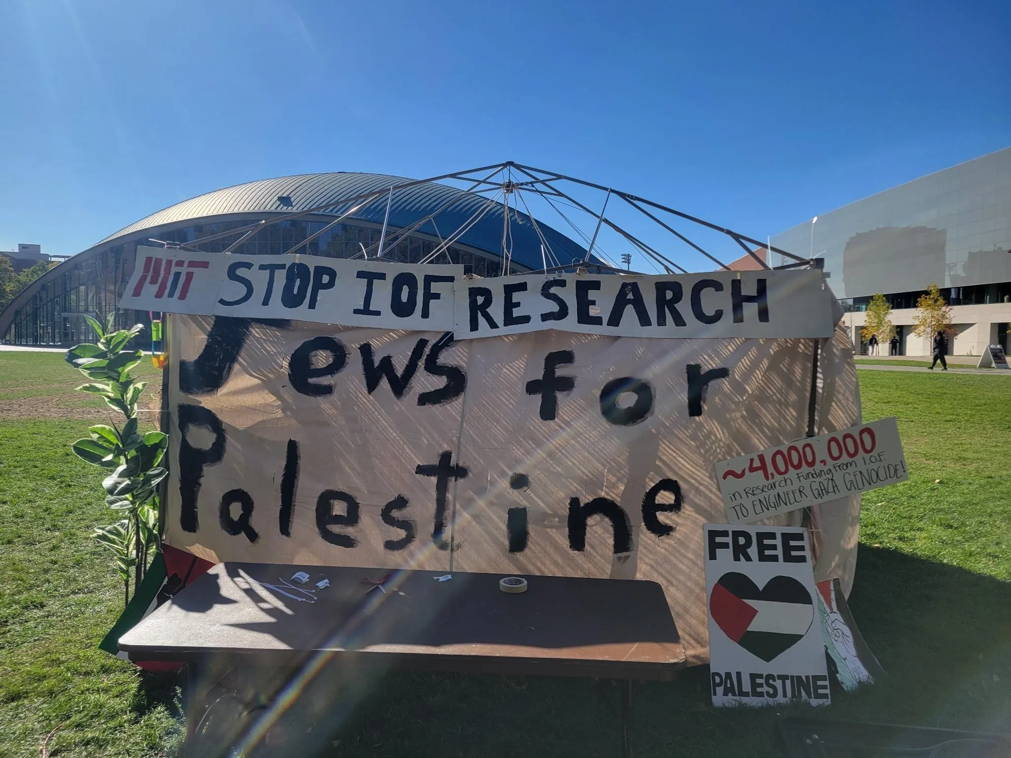 Jews for Palestine sukkah with “MIT Stop IOF Research” at the top